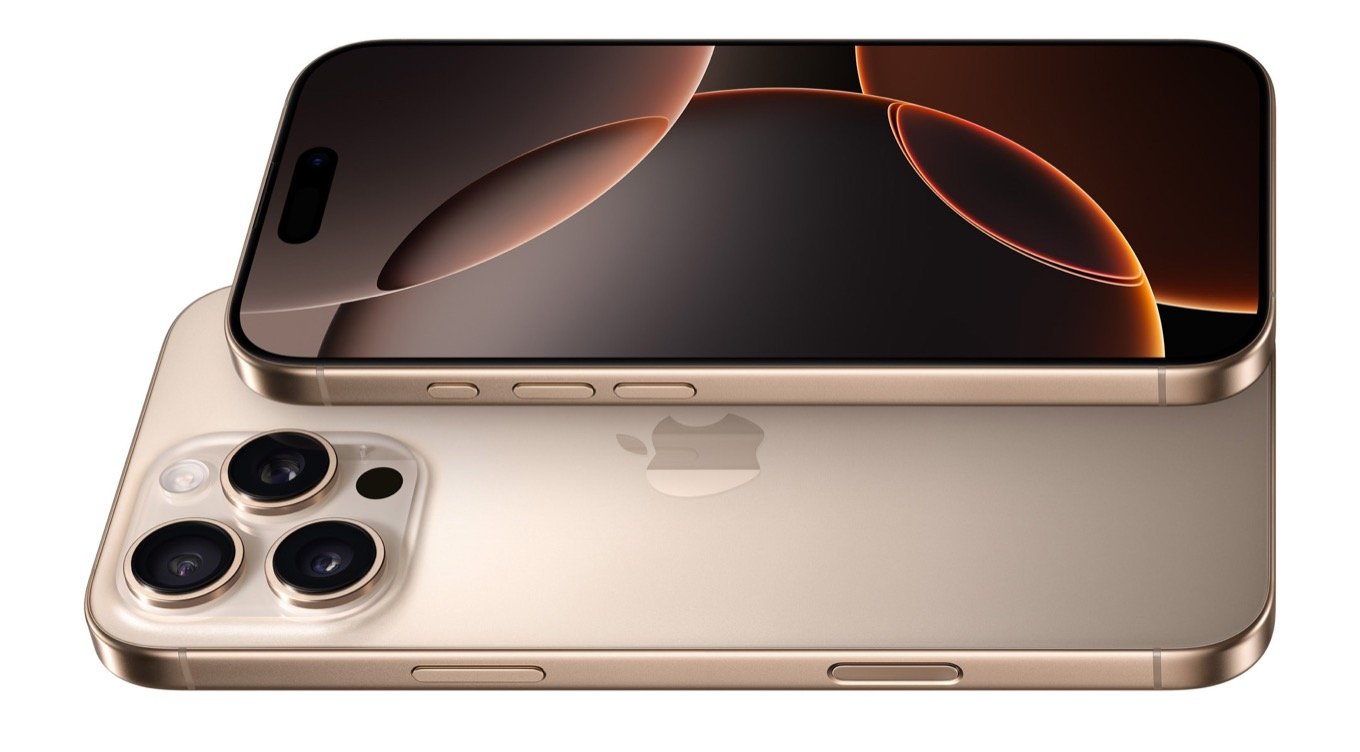 Two gold iPhone 16 smartphones stacked slightly offset, showcasing the rear camera system and front display.