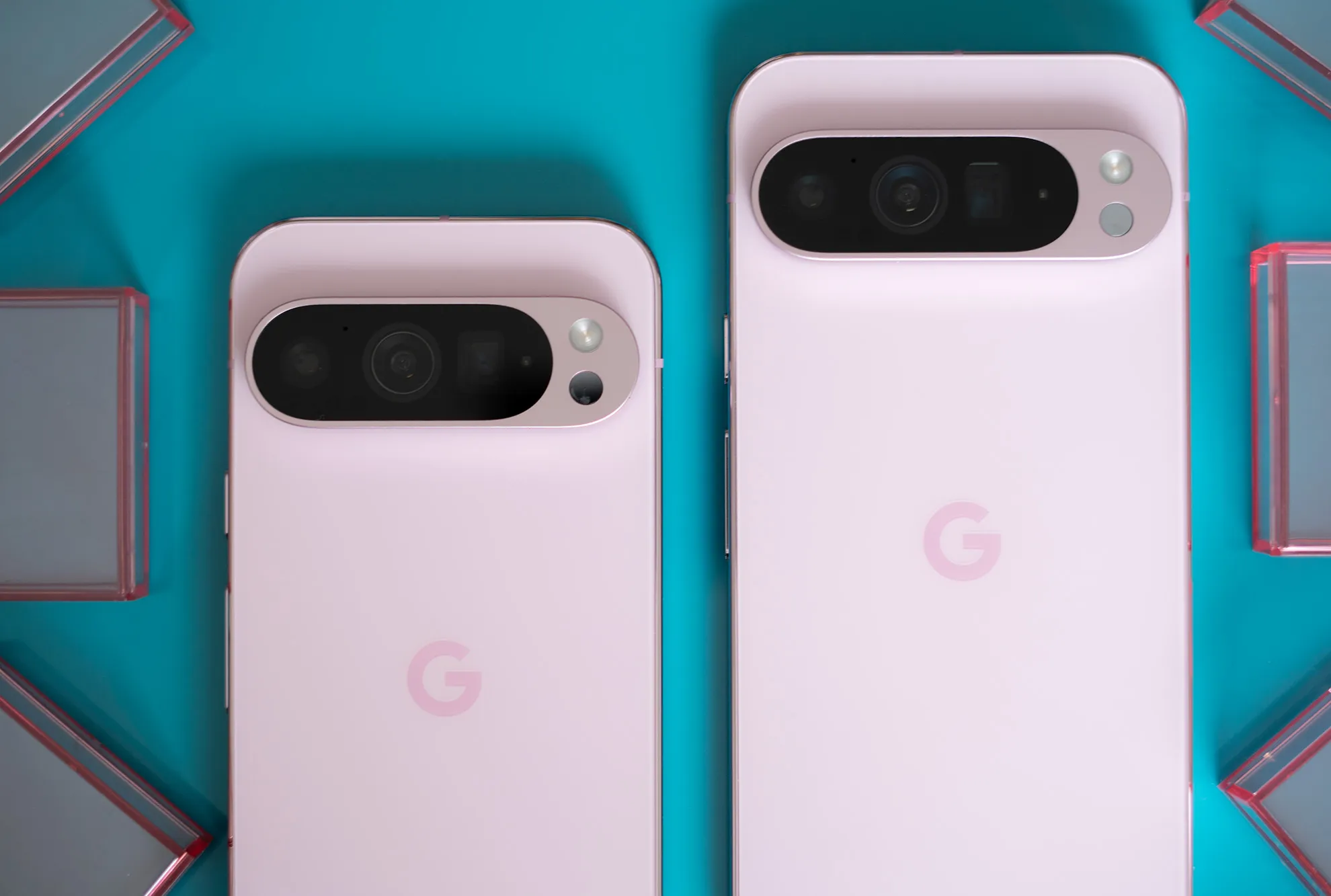Two pink Google Pixel smartphones